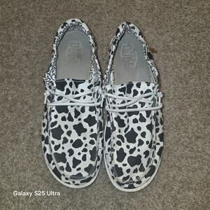 EUC Hey Dude, cow print slip on shoes size 10w